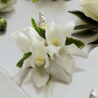 White Mini Cymbidium Boutonniere – SIXTO'S FLOWER SHOP, Union City NJ